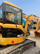 2024 Caterpillar 303.5E mini excavator, rear three-quarter view 2024 Caterpillar 303.5E mini excavator, rear three-quarter view