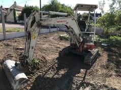 2012 Takeuchi TB219 mini excavator, front three-quarter view