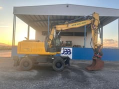 2013 New Holland WE170B wheel excavator side view 2013 New Holland WE170B wheel excavator side view