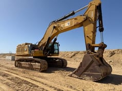2022 Caterpillar 395 crawler excavator, side view
