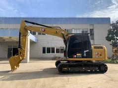 Caterpillar 312D2GC crawler excavator, side view Caterpillar 312D2GC crawler excavator, side view