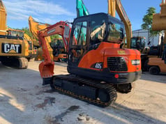 2021 Doosan DX60 mini excavator, rear three-quarter view