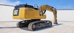 2016 Caterpillar 352F crawler excavator, rear three-quarter view