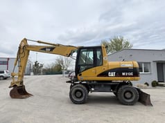 2006 Caterpillar M313C wheel excavator, side view 2006 Caterpillar M313C wheel excavator, side view