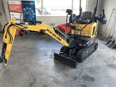 2023 New Holland E15X mini excavator, side view 2023 New Holland E15X mini excavator, side view