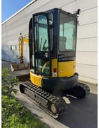 2017 Komatsu PC26MR-3 mini excavator, rear three-quarter view