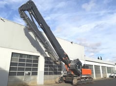 2021 Hitachi KMC500 S-6 demolition excavator, side view with extended boom