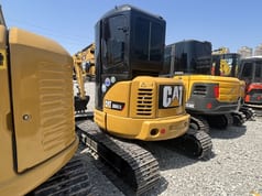 2024 Caterpillar 304CR mini excavator, rear three-quarter view 2024 Caterpillar 304CR mini excavator, rear three-quarter view