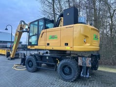 2021 Caterpillar MH22 material handler, rear three-quarter view