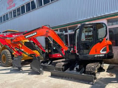 2024 Doosan DX60 crawler excavator, side view 2024 Doosan DX60 crawler excavator, side view