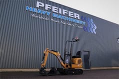 2021 Caterpillar 300.9D mini excavator, side view
