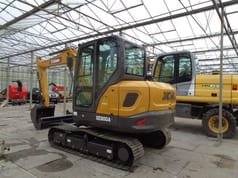 2023 XCMG XE60GA mini excavator, rear three-quarter view