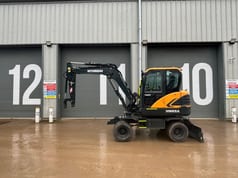 2023 Hyundai HW65A wheel excavator, side profile view