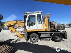 2010 Liebherr A316 wheel excavator, side view 2010 Liebherr A316 wheel excavator, side view