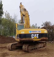 2018 Caterpillar 320C crawler excavator, rear three-quarter view