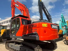 2023 Doosan DX225LCA crawler excavator, rear three-quarter view