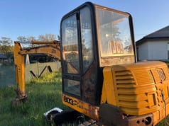 2000 JCB 803 Plus excavator, rear three-quarter view 2000 JCB 803 Plus excavator, rear three-quarter view