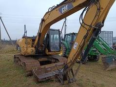 2007 Caterpillar 312C crawler excavator, side view 2007 Caterpillar 312C crawler excavator, side view