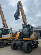 2024 Liebherr A916 Compact wheel excavator, front three-quarter view
