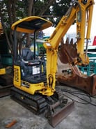 2022 Komatsu PC18MR mini excavator, front three-quarter view 2022 Komatsu PC18MR mini excavator, front three-quarter view