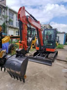 2022 Hitachi ZX55USR-5A mini excavator, front three-quarter view 2022 Hitachi ZX55USR-5A mini excavator, front three-quarter view