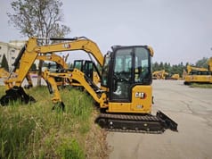 2026 Caterpillar 302CR mini excavator, side view 2026 Caterpillar 302CR mini excavator, side view