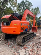 2024 Hitachi Zaxis 70 mini excavator, rear three-quarter view