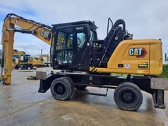 2021 Caterpillar MH3024 wheel excavator side view 2021 Caterpillar MH3024 wheel excavator side view