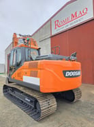 2022 Doosan DX140LC-7 crawler excavator, rear three-quarter view