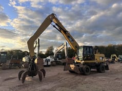 2012 Caterpillar M318 MH material handler, front three-quarter view 2012 Caterpillar M318 MH material handler, front three-quarter view