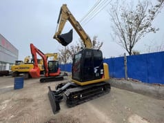 2024 Caterpillar 308E mini excavator, front three-quarter view