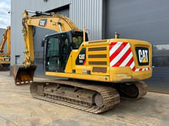 2018 Caterpillar 323 crawler excavator, rear three-quarter view