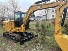 2021 Caterpillar 306 mini excavator, side view 2021 Caterpillar 306 mini excavator, side view