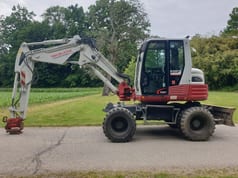 2013 Takeuchi TB295W wheel excavator, side view