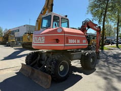 2001 Atlas 1004 M wheel excavator, rear three-quarter view