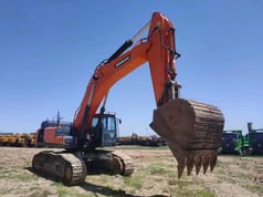 Doosan DX520LC-9C crawler excavator, front three-quarter view
