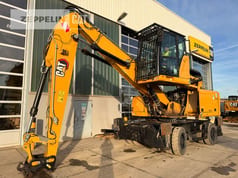 2020 Caterpillar MH3022-06C material handler, side view