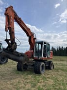 1995 Atlas 1304K excavator, front three-quarter view 1995 Atlas 1304K excavator, front three-quarter view