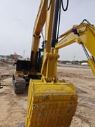 Komatsu excavator, close-up view of bucket and arm