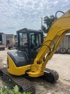 2024 Komatsu PC40MR-2 mini excavator, rear three-quarter view 2024 Komatsu PC40MR-2 mini excavator, rear three-quarter view
