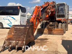 1995 Fiat-Hitachi FH200W.3 wheel excavator, front three-quarter view