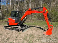 2023 Kubota KX057-4 crawler excavator, side view
