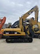 2024 Caterpillar 320C crawler excavator, side view