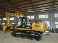 Caterpillar 325D crawler excavator, side profile view Caterpillar 325D crawler excavator, side profile view