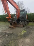 2017 Hitachi ZX135US crawler excavator, front three-quarter view 2017 Hitachi ZX135US crawler excavator, front three-quarter view