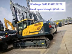 2025 Hyundai HX220L crawler excavator, rear three-quarter view 2025 Hyundai HX220L crawler excavator, rear three-quarter view