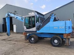 2010 Fuchs MHL 331 material handler side view
