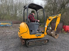 2011 JCB 8014 mini excavator side view