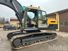 2011 Volvo EC250DL crawler excavator side view