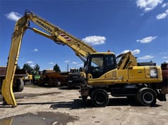 2006 Komatsu PW220MH material handler side view